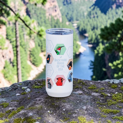 Beakwings white stainless steel Spotter Tumbler featuring colorful bird stickers inside laser-engraved hexagon outlines.